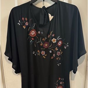 Like new dressy jumpsuit.  Beautiful and flattering! XL